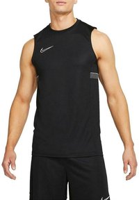 T-shirt de sport noir sans manches en tissu lisse, avec un logo Nike blanc sur la poitrine et un accent argenté discret sur le côté.