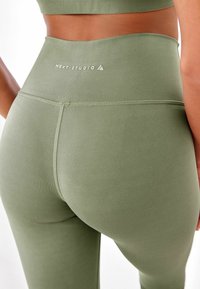 Next WRAP FRONT HIGH WAIST - Leggings - Byxor - olive green