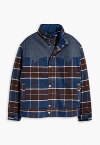 Plaid jacket in brown, blue, and white, featuring a denim shoulder yoke, snap closures, and side pockets. Soft wool blend fabric.