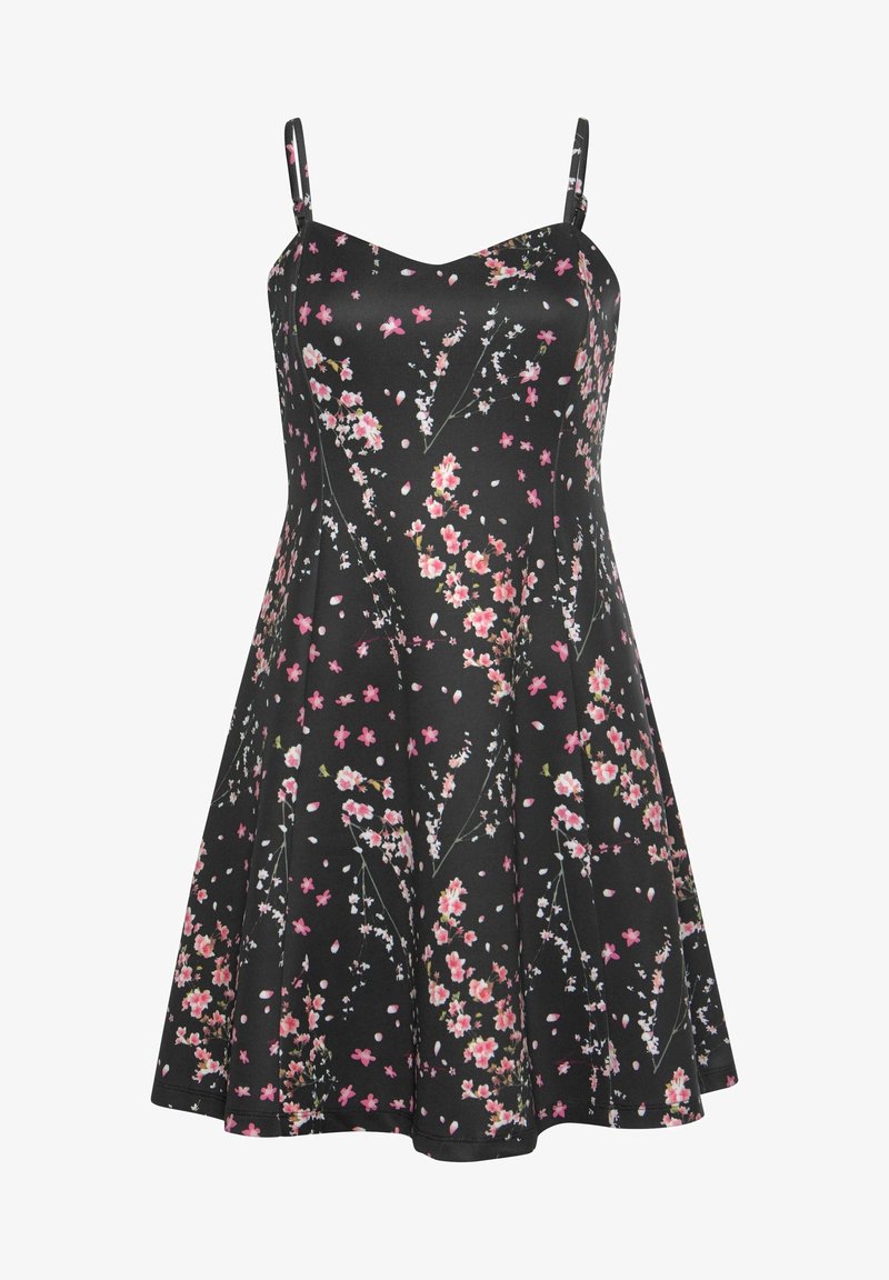 Robe noire à fines bretelles, ornée d'un motif floral en rose et blanc. Le tissu est lisse et le design s'évase à partir de la taille.