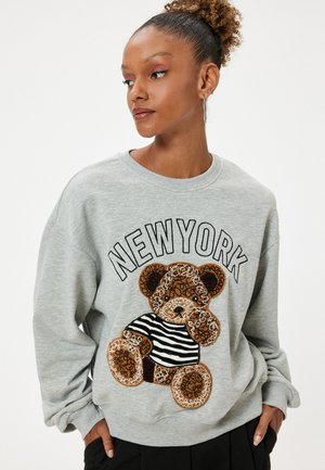 - Bluza