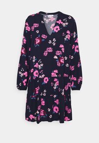 Navyblaues Kleid mit langen Ärmeln, V-Ausschnitt und pinkem Blumendruck in verschiedenen Größen, mit lockerer Passform und gestuftem Rockdesign.