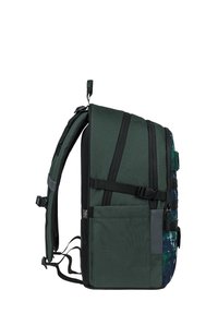 Green fabric backpack with a structured shape, featuring black accents, adjustable straps, and a side pocket with a textured pattern.