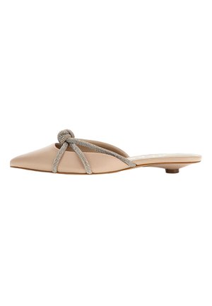 Nude faux leather slip-on shoe with a pointed toe, featuring a knotted rhinestone strap across the upper and a small heel.