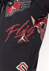 Jordan Pantalones deportivos - black/sail