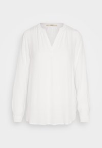 Chemise blanche à manches longues avec un décolleté en V, fabriquée dans un tissu léger, présentant des détails plissés et une coupe décontractée. Design simple et polyvalent.