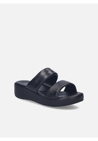 Sandale compensée noire avec deux larges brides en cuir et semelle rembourrée, conçue pour une tenue décontractée et le confort.