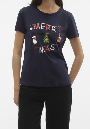 Navy blue t-shirt featuring "MERRY XMAS" in colorful letters with festive icons: a penguin, Christmas tree, and reindeer, all with textured detail.