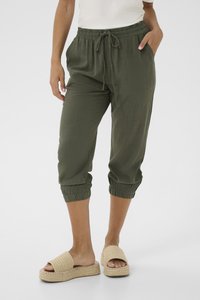 Olivengrønne cropped joggerbukser med elastisk talje, snoretræk og elastiske manchetter; blødt, tekstureret stof; sidelommer.