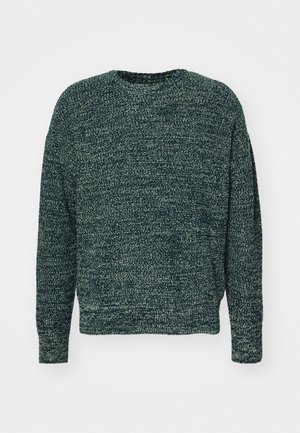 Maglione lavorato a maglia verde scuro, texture, con scollatura a girocollo, maniche lunghe e vestibilità rilassata. Sottili motivi a contrasto realizzati con un filato diverso.