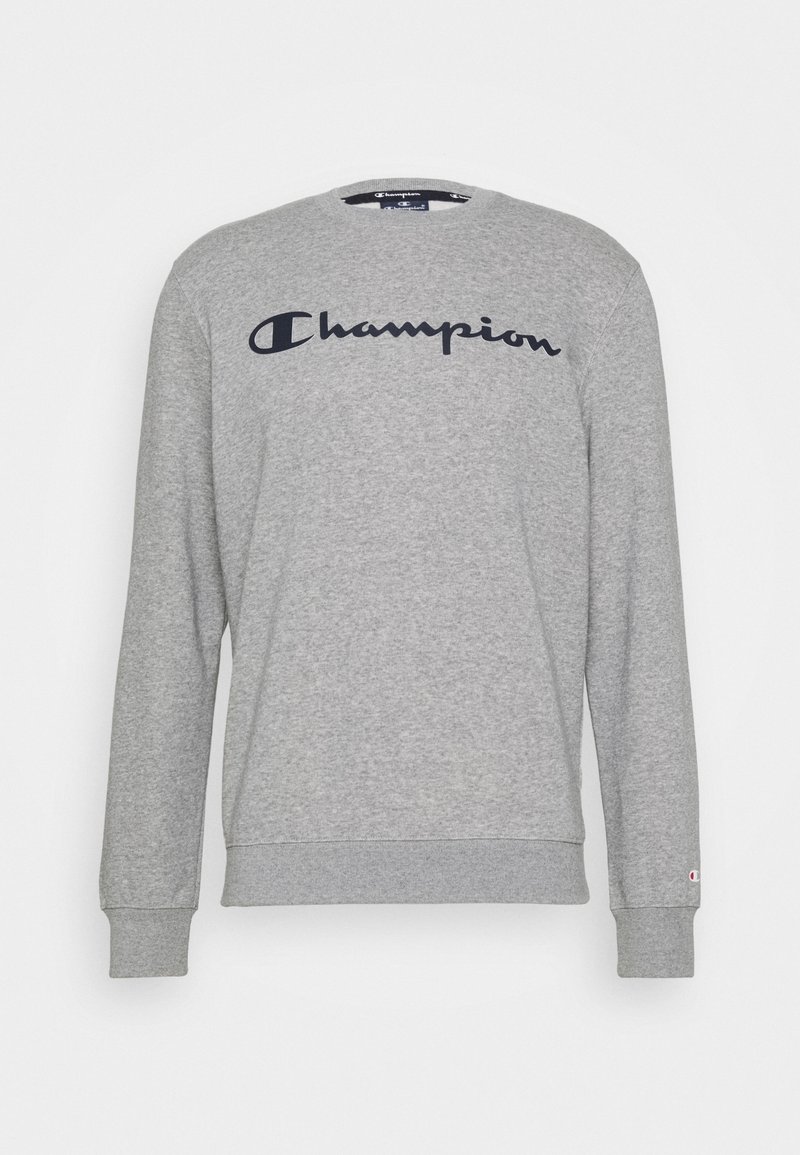 Felpa grigia a maniche lunghe con polsini e orlo a coste, con un grande logo Champion blu navy sul petto e un piccolo logo sulla manica sinistra.