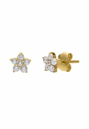 Gold stud earrings shaped like flowers with six round clear gemstones on a white background, one facing forward and one sideways.