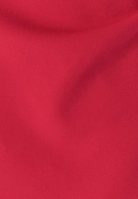 Bright red fabric with a smooth, matte texture, featuring soft drapes and no visible patterns or hardware. Even color throughout.