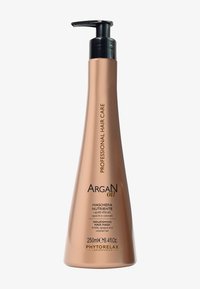 Bouteille en plastique bronze brillante avec une pompe noire, étiquetée "Soin Capillaire Professionnel à l'Huile d'Argan." Capacité : 250 ml, avec un design élégant et effilé.