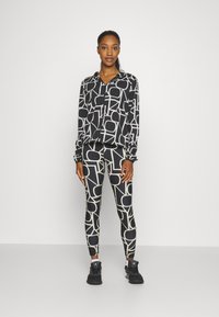 ONLY Play FONT LOGO TRAIN - Tights - black