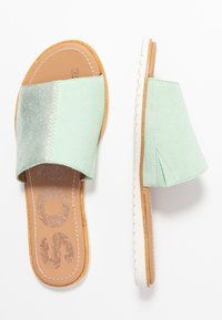 Sorel Platt slip-in - mint