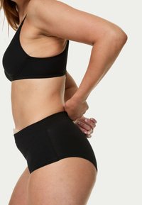 Zwart stretchstof bralette en hooggeplaatste ondergoedset. Gladde textuur, minimale naden, racerback ontwerp op de top en elastische tailleband.