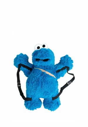 Blue furry backpack shaped like a cartoon character with large eyes and black adjustable shoulder straps against a white background.