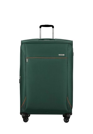 Grande valise souple vert foncé avec poignée télescopique argentée étendue, poche zippée avant et quatre roues pivotantes noires.
