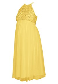 Robe jaune avec un corsage orné de sequins, design à col halter et jupe fluide en tulle. Légère, texture lisse, longueur maxi.