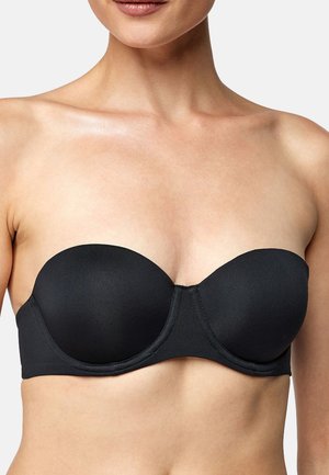 Zwarte strapless beha gemaakt van gladde stof, met voorgemaakte cups en een naadloos ontwerp, met zichtbare stiksels langs de randen.