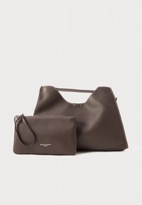 Brown leather handbag with textured finish and a decorative seam, paired with a smaller matching zippered pouch featuring a wrist strap.