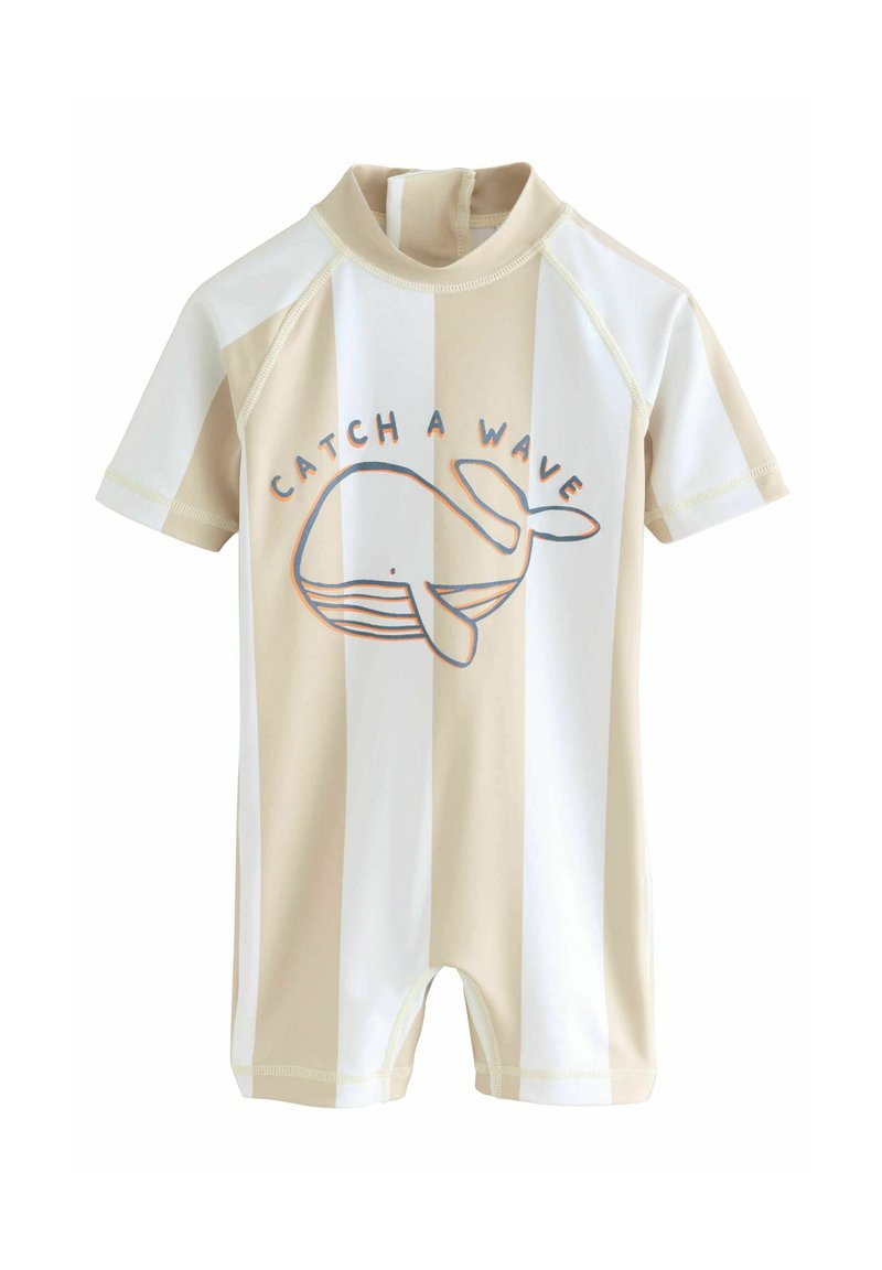 Mutino corto a maniche corte a righe beige e bianche con collo rotondo. Presenta una grafica di una balena e il testo "CATCH A WAVE" in arancione scuro.