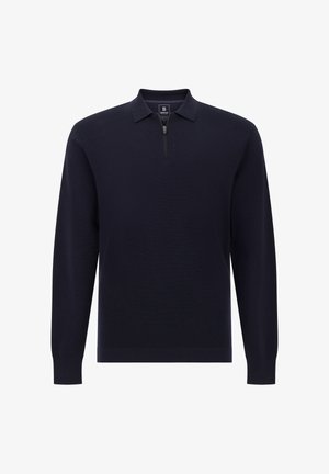 Pull-over à manches longues bleu marine avec un col zippé à quart, mettant en avant un motif tricoté texturé et des poignets et un ourlet côtelés pour un look ajusté.