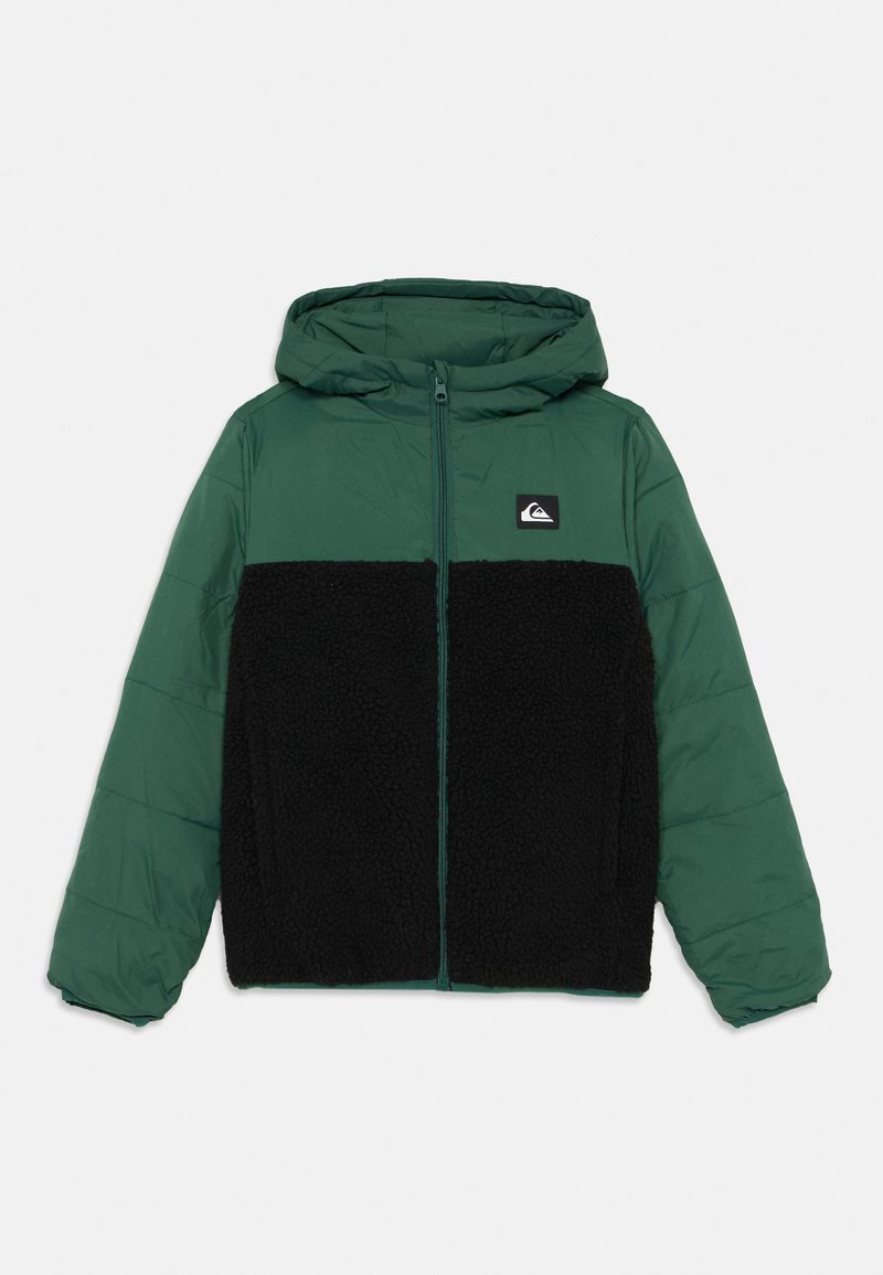 Padded jacket with a hood, featuring a green upper and a black textured fleece lower section, front zip, and logo patch at the chest.