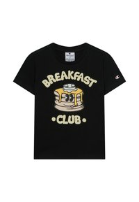 Czarny, krótkosleeve'owy t-shirt Champion z rysunkowymi pancakes udekorowanymi masłem i syropem oraz napisem "ŚNIADANIOWY KLUB" z przodu.