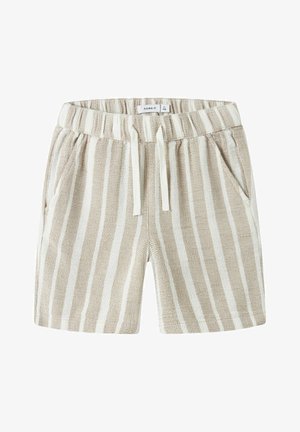 Shorts en tricot beige et blanc à rayures avec une taille élastique et un cordon blanc, dotés de poches latérales et d'une étiquette à l'intérieur de la taille.