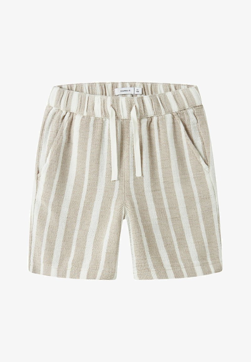 Shorts en tricot beige et blanc à rayures avec une taille élastique et un cordon blanc, dotés de poches latérales et d'une étiquette à l'intérieur de la taille.