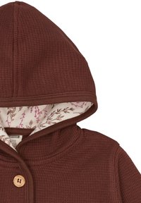 Bruine wafelgebreide hoodie met een voering in bloemmotief. Voorzien van een houten knoopsluiting en een zachte, gestructureerde stof.