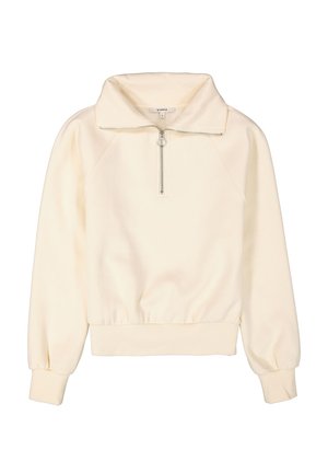 Suéter color crema con un cuello alto, cierre de media cremallera en la parte delantera, mangas raglán y una cintura ajustada. Tejido suave y liso con una silueta relajada.