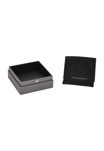 Black accessories box and pouch, both featuring a smooth texture. Box has a gray exterior and an embossed logo; pouch is soft with a flap closure.