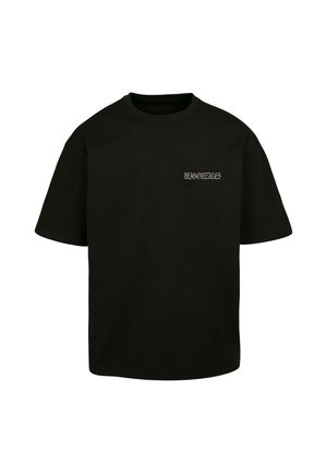 Black cotton T-shirt with short sleeves, crew neck, and front chest graphic in contrasting light color, featuring stylized text.