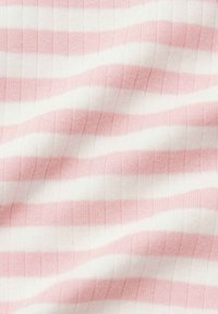Pink and white striped fabric with a soft texture and ribbed pattern, displaying smooth, evenly spaced lines.