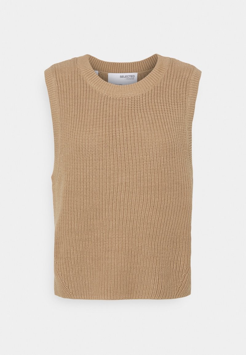Gilet en maille beige sans manches avec col rond, motif de points texturé et col côtelé, présenté sur un fond clair uni.