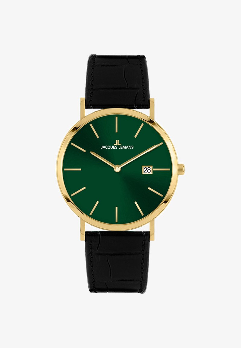 Goldene Armbanduhr mit einem tiefgrünen Zifferblatt, verlängerten Stundenmarkierungen, Datumsanzeige bei 6 Uhr und einem schwarzen Lederarmband im Krokodil-Muster.