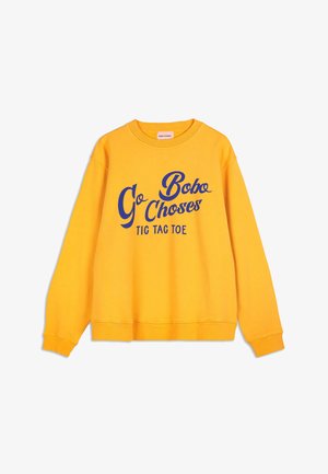Sweatshirt jaune à manches longues avec un texte bleu disant "Go Bobo Choses TIC TAC TOE" sur le devant, col rond et poignets et hem à côtes.