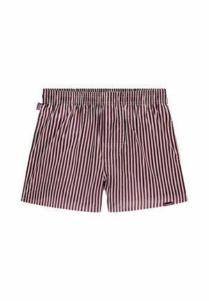 Boxers rayés en marron foncé et rose clair, taille élastique, coupe loose, avec deux poches latérales et une petite étiquette sur le côté gauche.