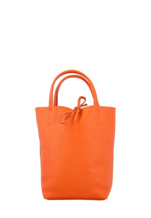 Orange leather tote bag with a textured surface. Features two rounded handles and a tied accent at the top opening. Minimalistic design.
