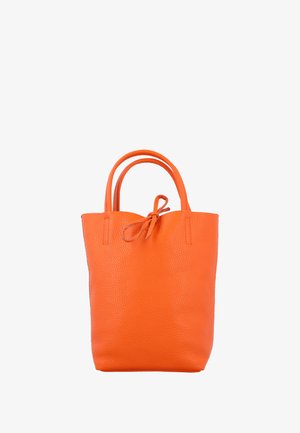 Orange leather tote bag with a textured surface. Features two rounded handles and a tied accent at the top opening. Minimalistic design.