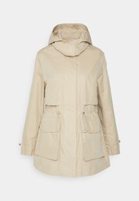 Veste à capuche beige avec fermeture éclair sur le devant, deux grandes poches avant avec rabats et cordons de taille réglables, présentée sur fond blanc.