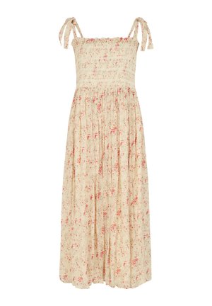 Beiges ärmelloses Maxikleid mit gerafftem Oberteil, gebundenen Schulterträgern und rotem Blumenmuster auf dem fließenden Rock.