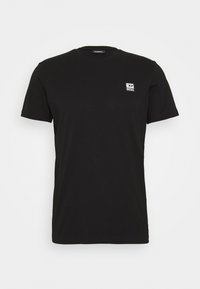 Schwarzes Kurzarm-T-Shirt mit Rundhalsausschnitt und kleinem weißen Diesel-Logo auf der linken Brust, auf einem schlichten weißen Hintergrund präsentiert.