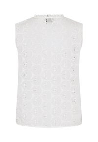 White sleeveless top featuring a cut-out pattern of overlapping ovals, textured fabric, and a ruffled neckline with a keyhole back detail.