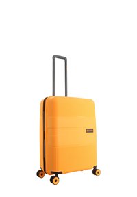 Hard-shell yellow suitcase with vertical ribbed texture, retractable grey handle, and four black wheels. Features a brand label on the side.