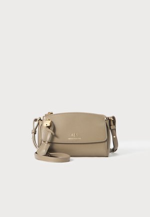Beige crossbody bag made of smooth synthetic material, featuring a zip closure, adjustable strap, and gold-tone hardware with logo detail.