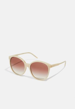 Lunettes de soleil - beige horn